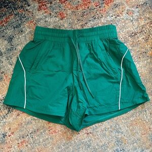 Green Athletic Shorts with White Trim
